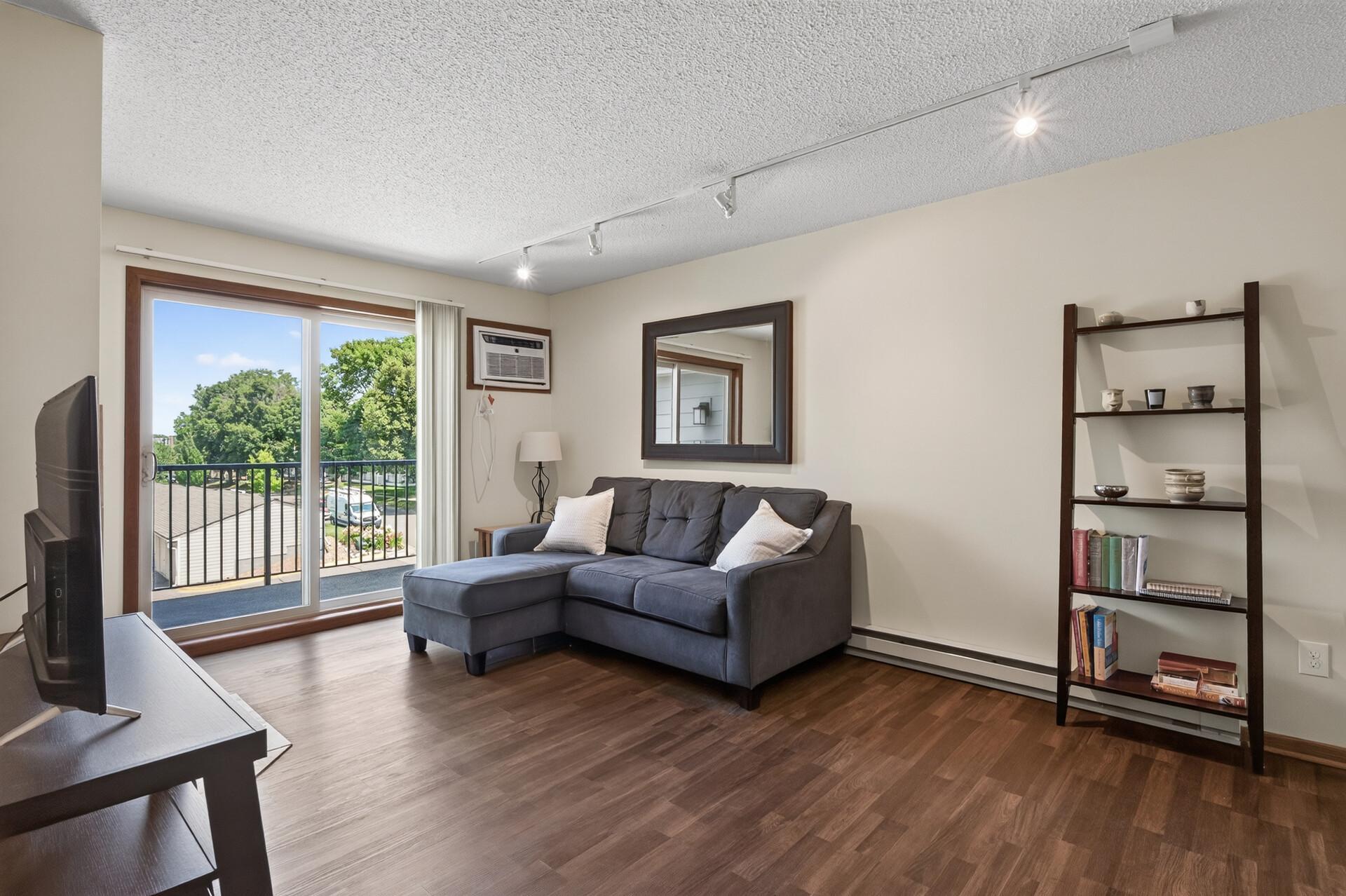 Spacious Living Room with updated flooring