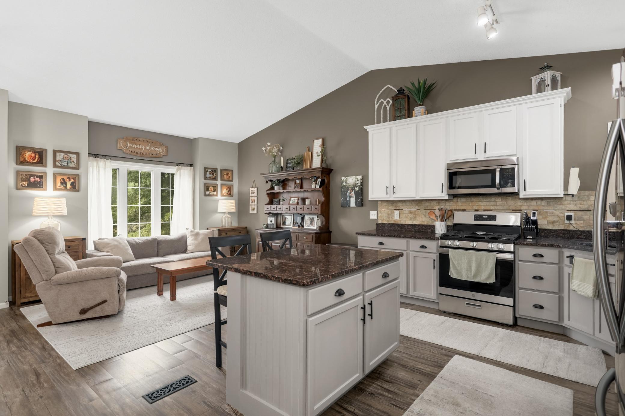 Spacious center island overlooking the bright front sitting area.