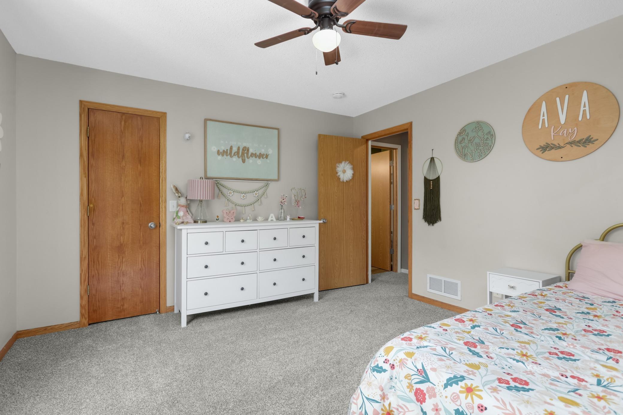 Primary bedroom with adjacent access to the upper level full bathroom