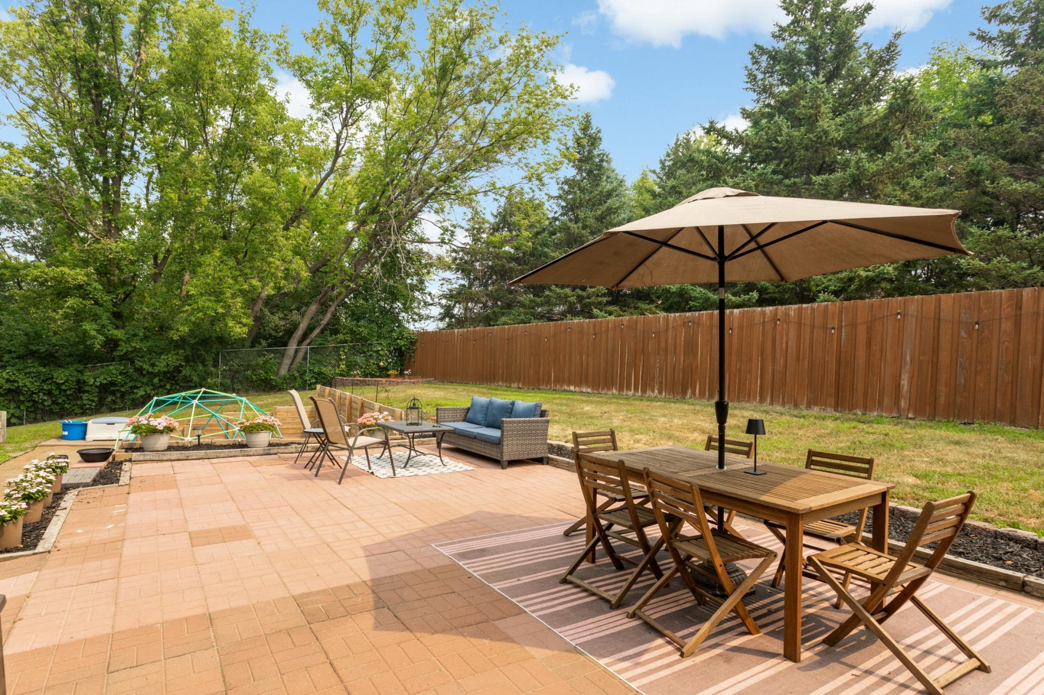 Enjoy summer evenings and outdoor dining in your private backyard.