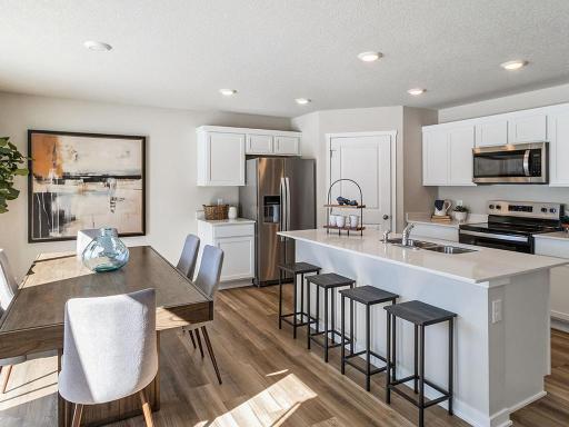 Open dining area and kitchen of Hamilton home.