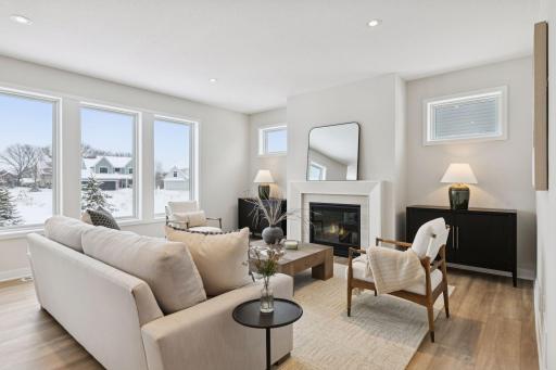 Cozy up to your gas fireplace and enjoy looking out of your home through your Andersen Fibrex windows!