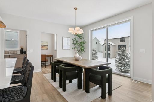 Large dinette area with huge 8 foot sliding glass doors!