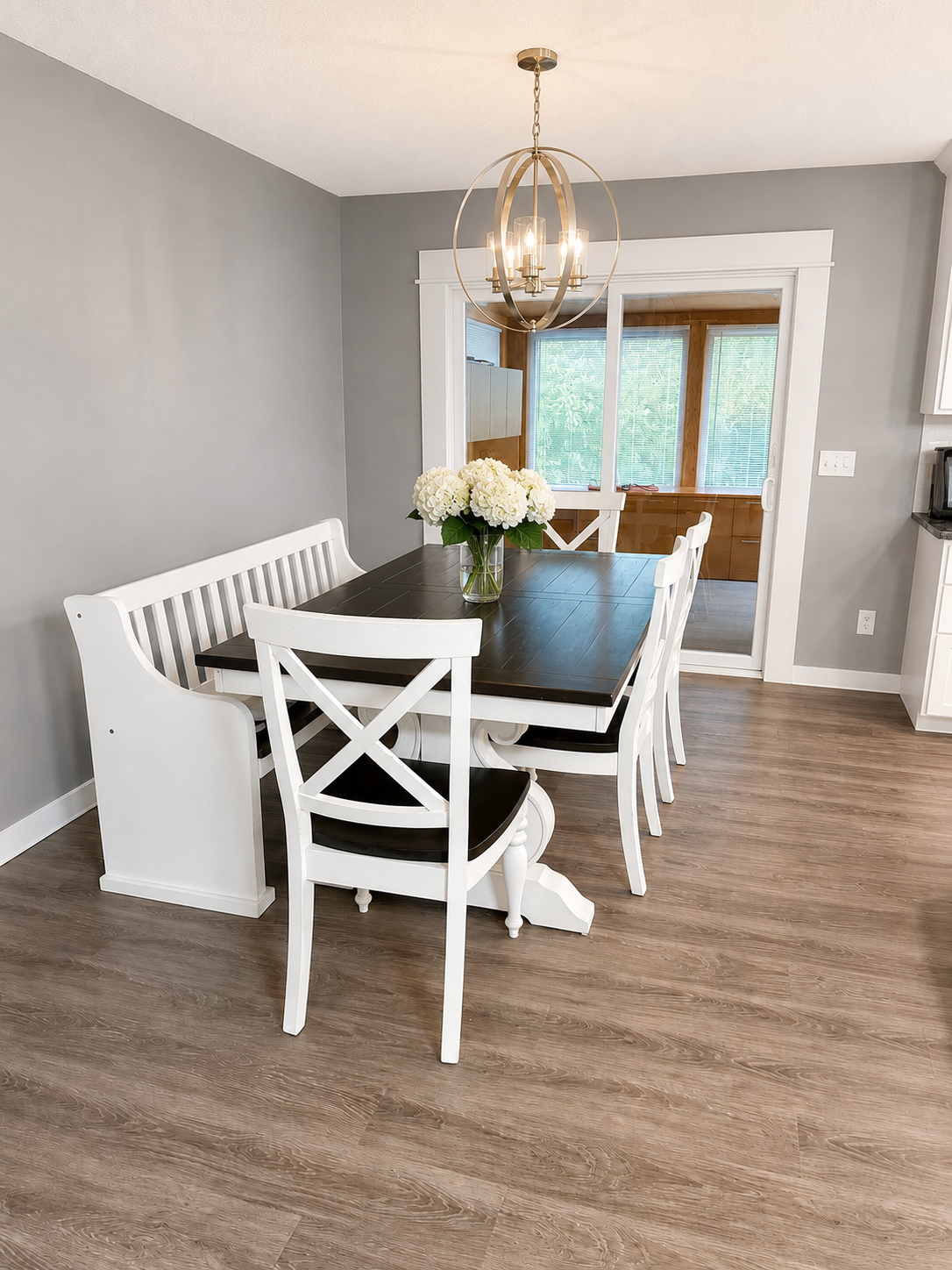 Dining area goes out to 3 season porch
