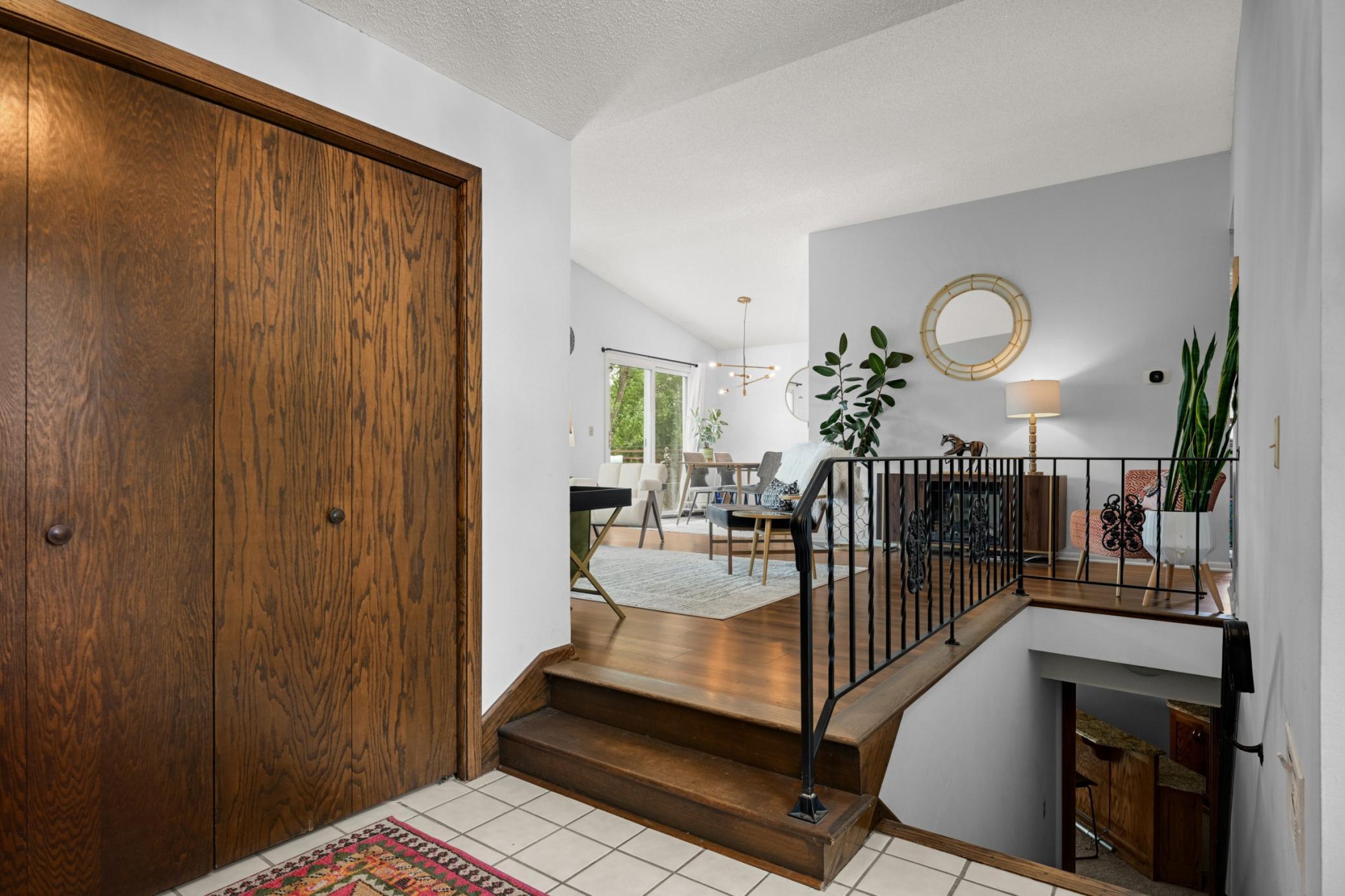 The spacious entry offers a great spot to shrug off the day or greet guests when they arrive.