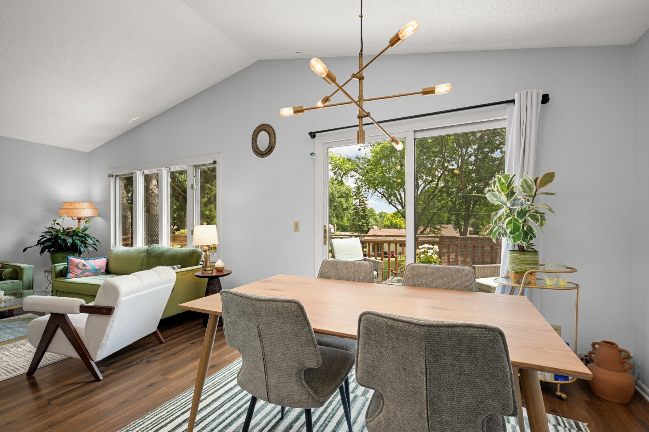 The dining room is adjacent to the living room