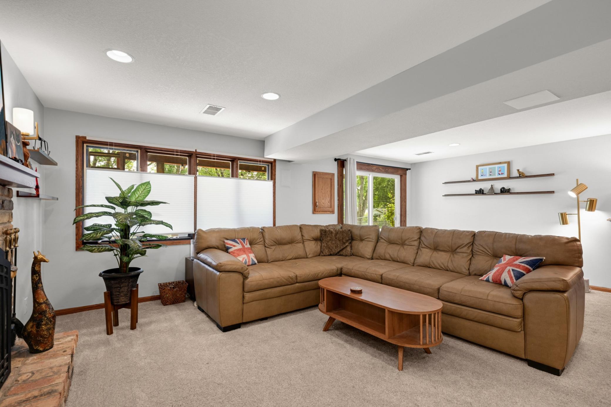 The lower level family room is cozy and generous in size.