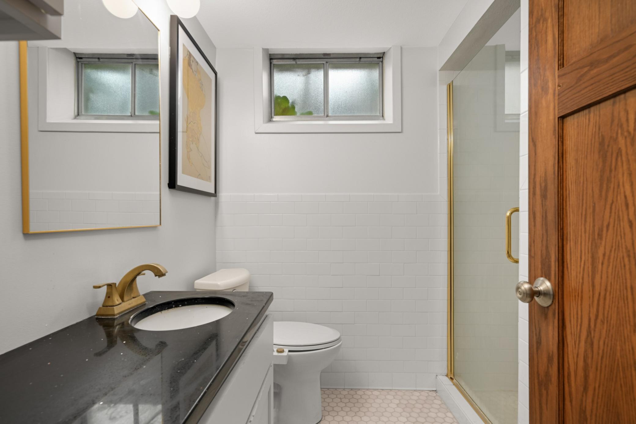 The 3/4 bath is across the hall from the lower level Primary bedroom.