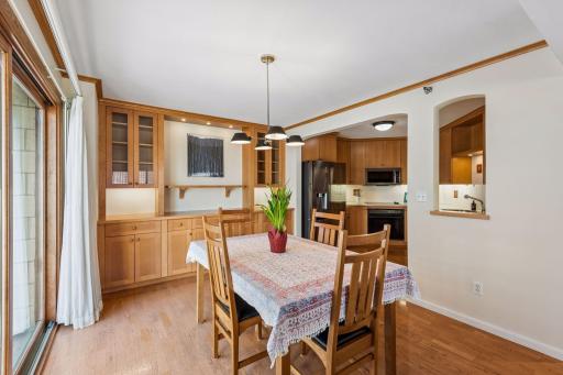 Bright and open dining area right off the kitchen and open to living room.