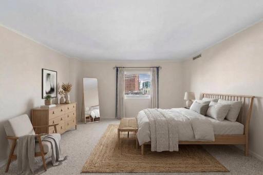 Primary bedroom includes walk-in closet and 3/4 bath en-suite. Virtually staged.