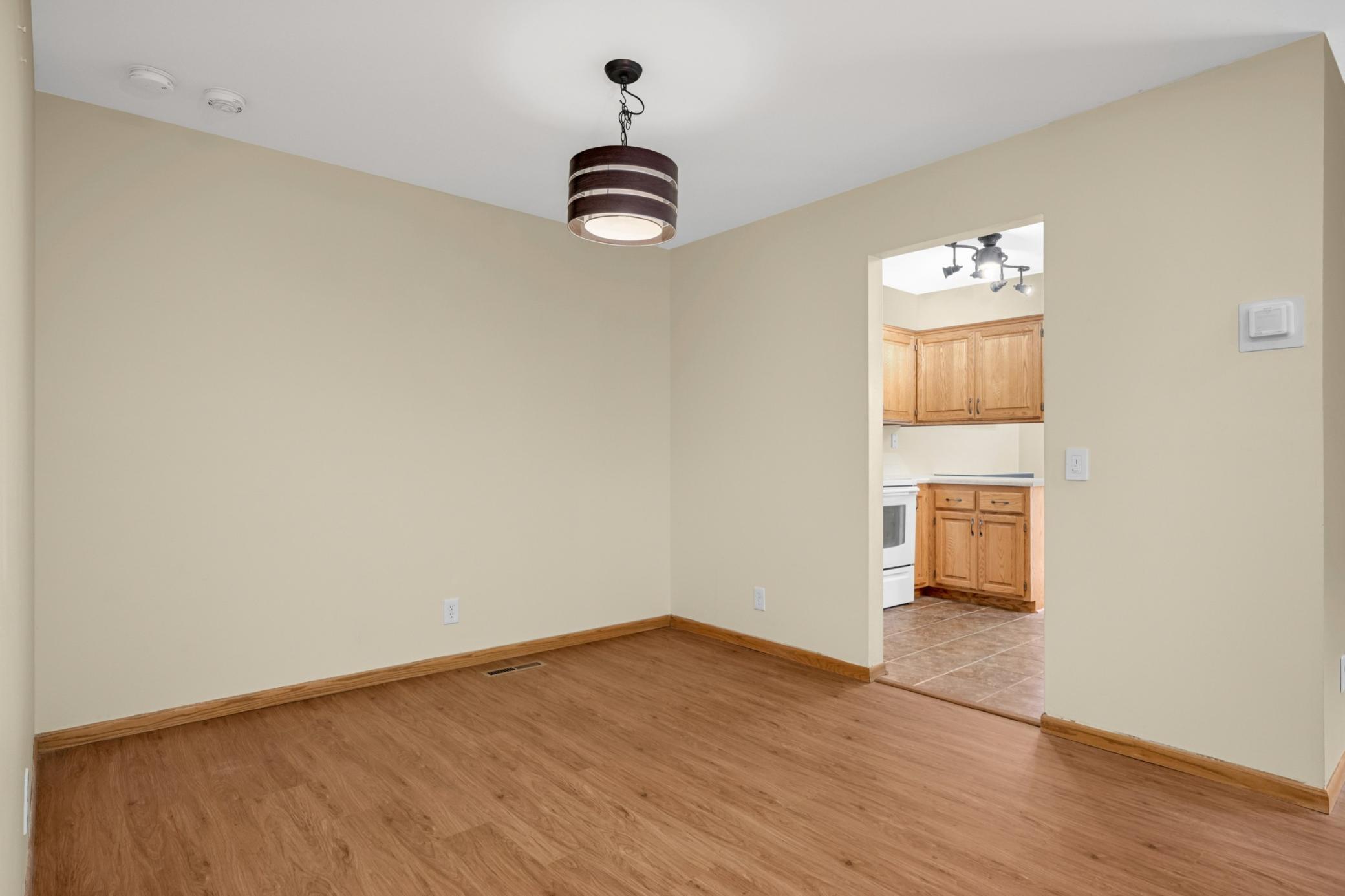 The formal dining room is an awesome room Newer flooring. NOTE almost all newer light fixtures throughout and also replaced is the smoke and carbon monoxide--2 in one. Strob lights installed for hearing impaired.