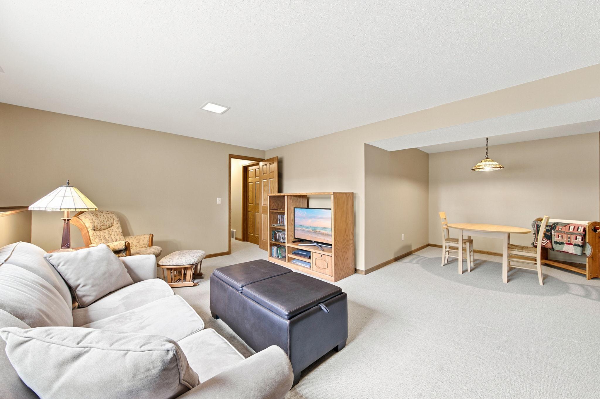 Fantastic lower level family room with extra bump out for games or hobbies!