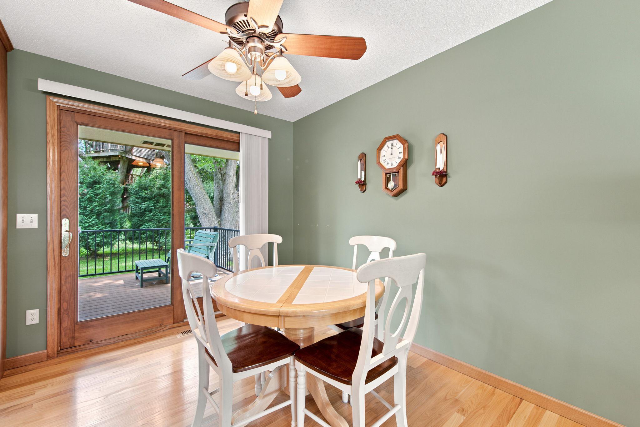Informal dining area walks out to the Trex deck and backyard!