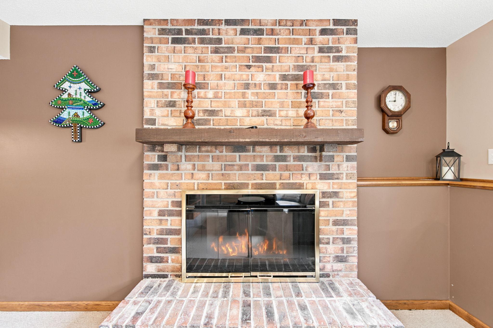 Beautiful gas fireplace with brick surround!
