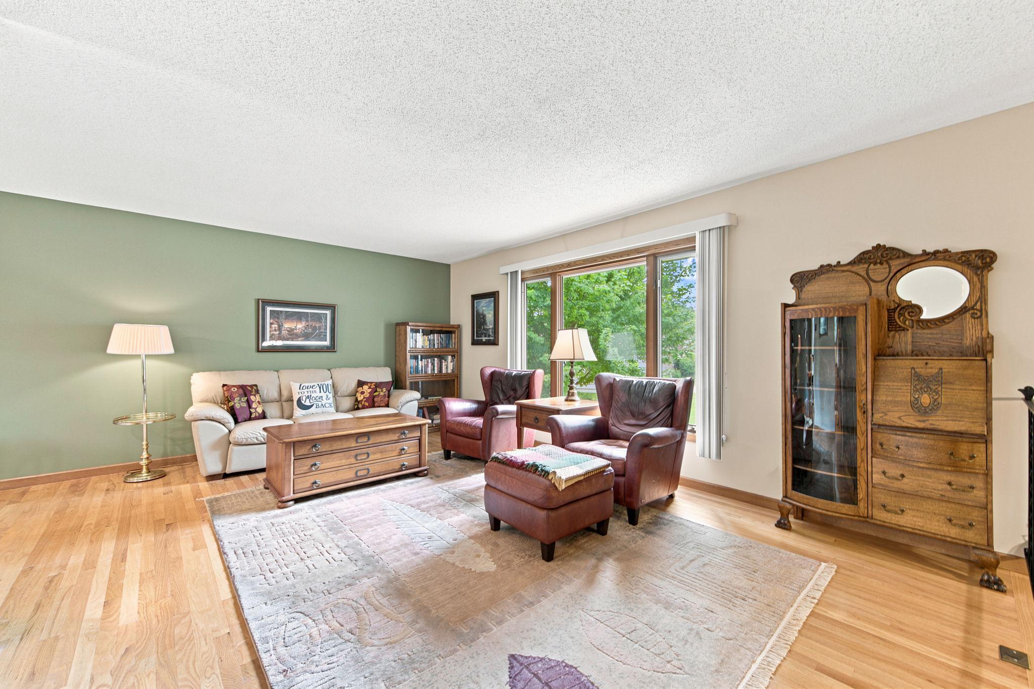 Beautiful oak hardwood floors and a large living room window!