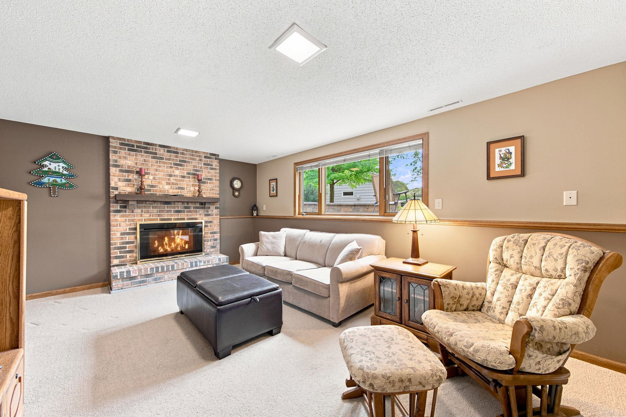 Cozy lower level family room with gas fireplace!