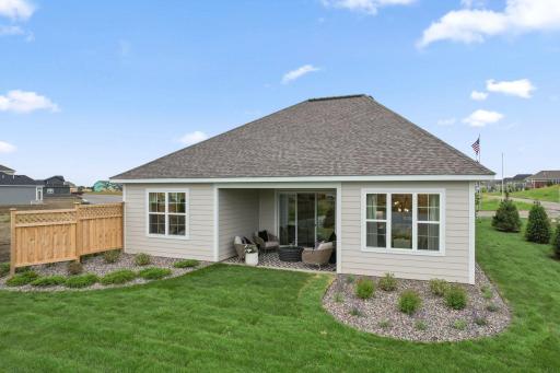 Cedar fencing provides additional privacy to enjoy your backyard.