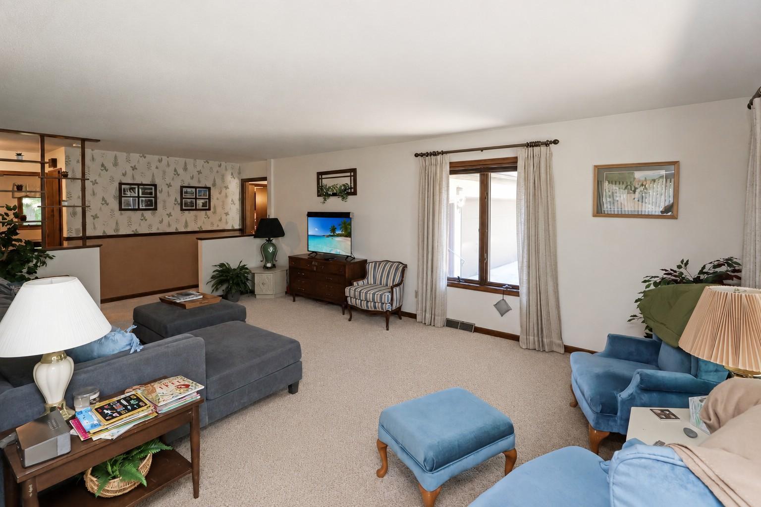 Living room (Seller is ready to install New Carpet).jpg