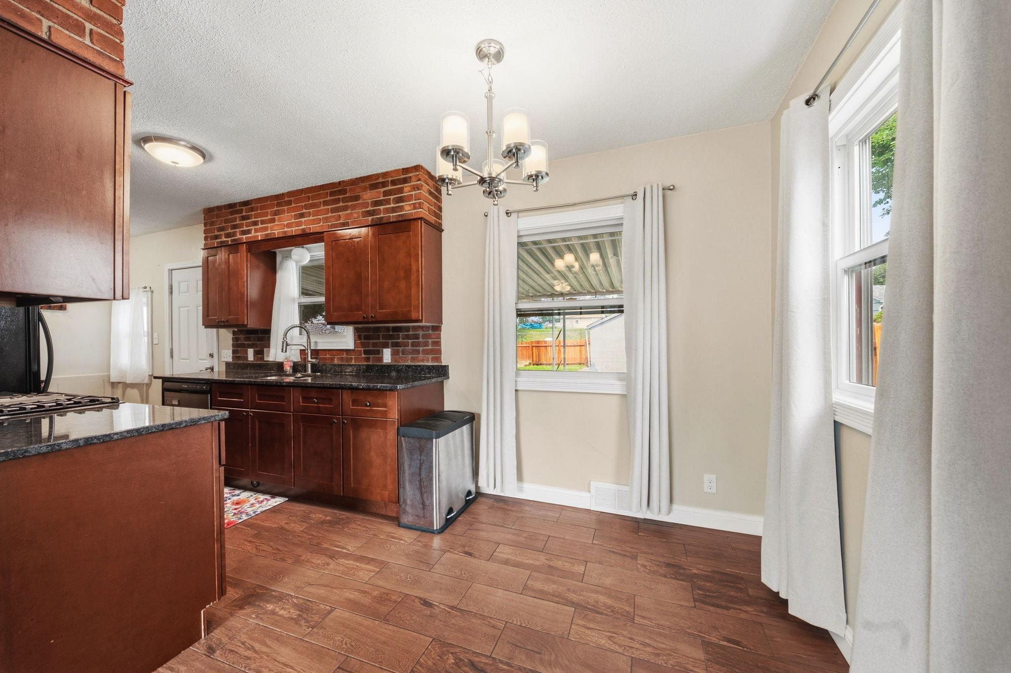 This informal dining room area was made for real life, cereal bowls, coffee mugs, and conversations before anyone's fully awake. The kind of corner your family actually uses every single day.
