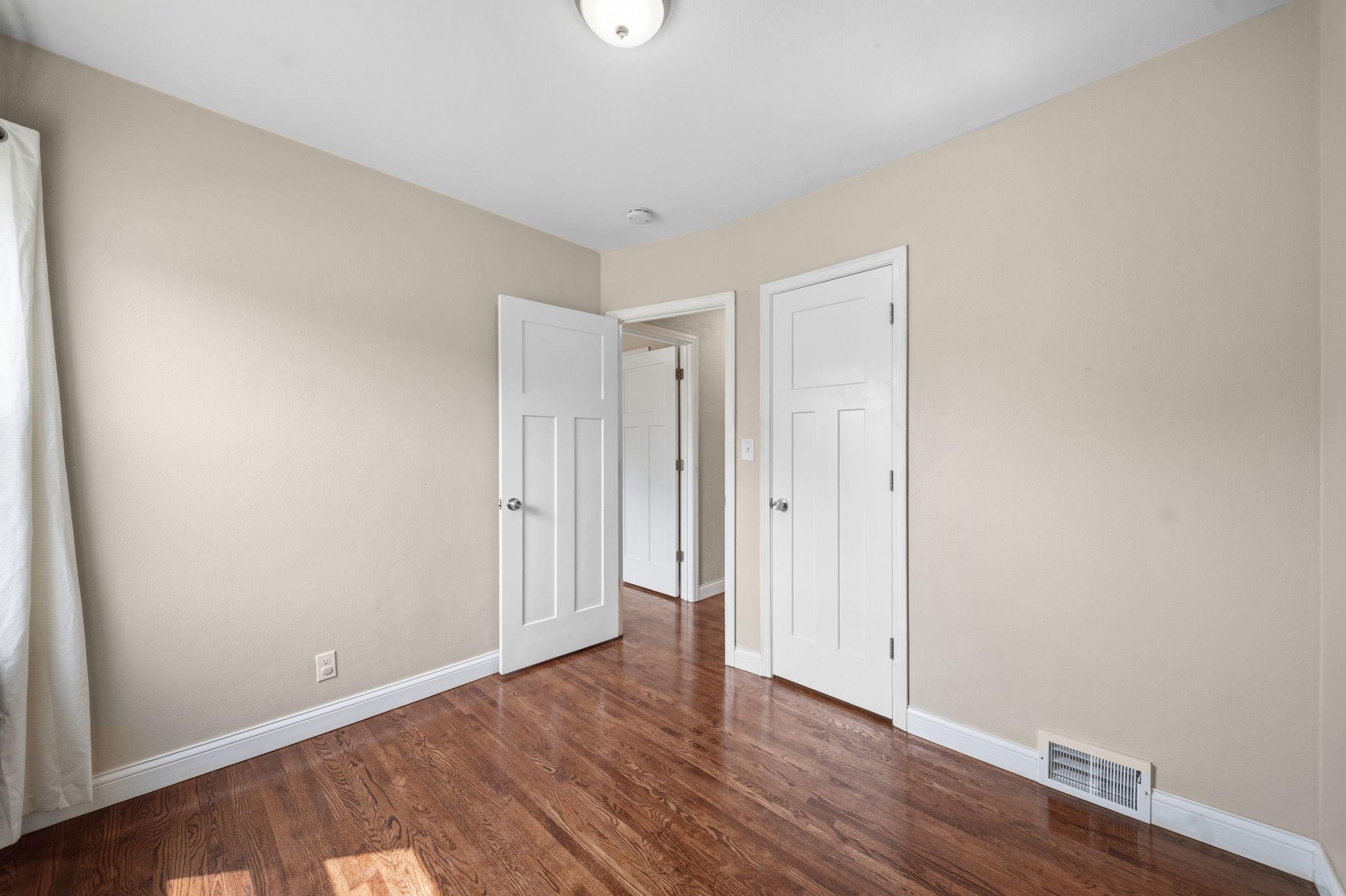 Two closets and a hallway connection that keeps this bedroom organized without even trying. Storage that works as hard as you do.
