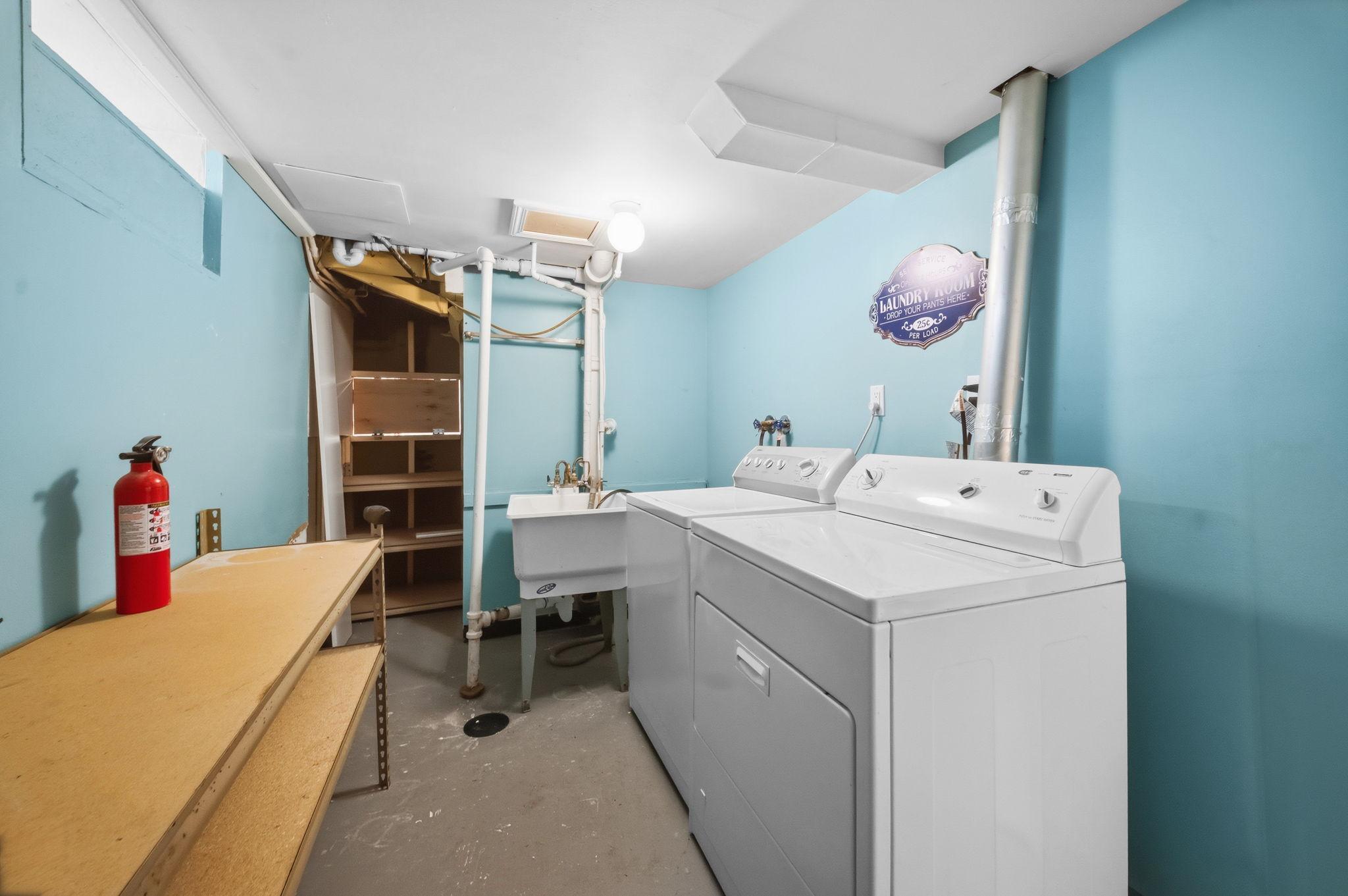 A dedicated laundry room with a utility sink and space for side by side machines. The room that keeps the whole household running.