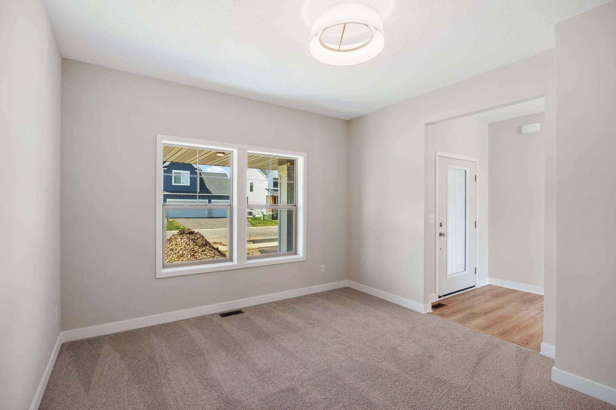 This can also be used as a formal dining area or sitting room.