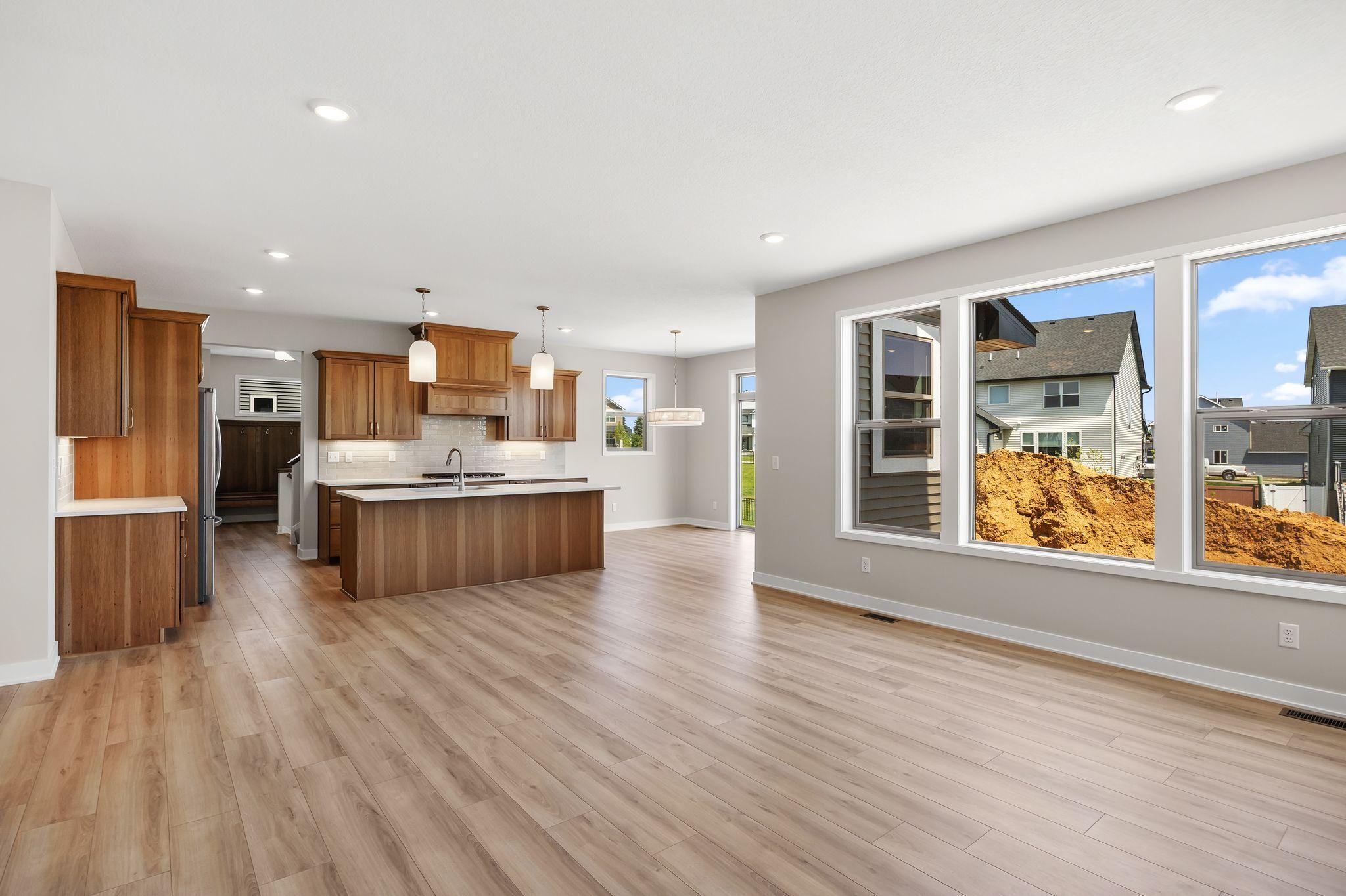 Gourmet kitchen with vented hood and extra large Island.