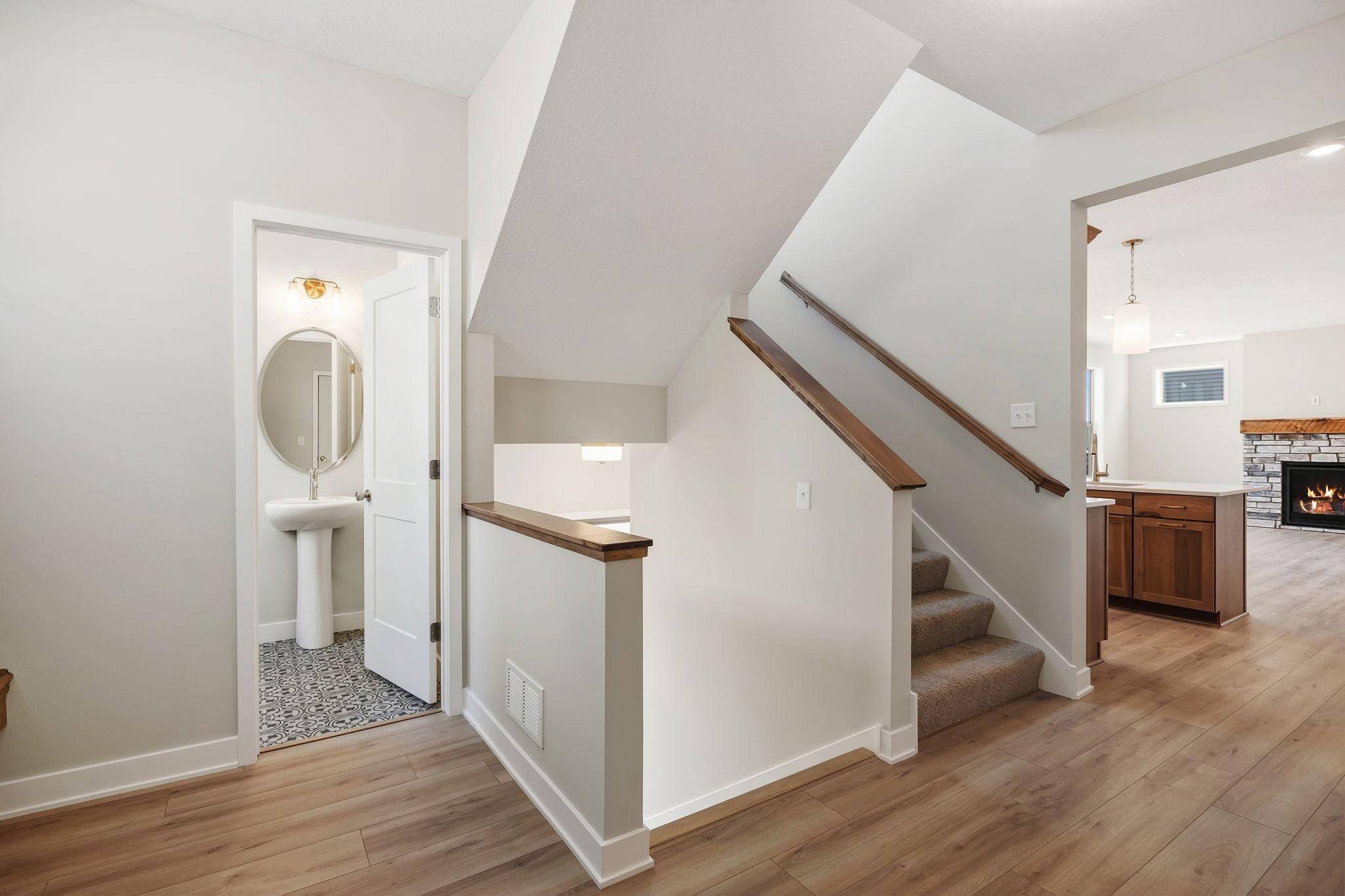 Mudroom with bathroom tucked out of sight.
