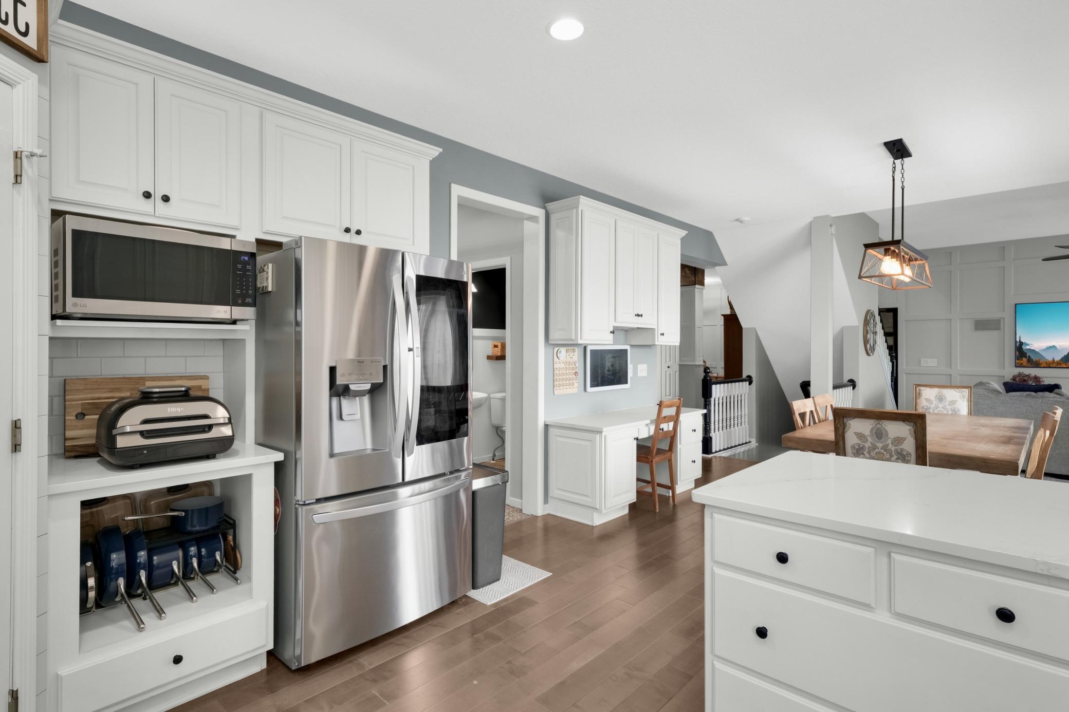 Kitchen opens up towards family room.