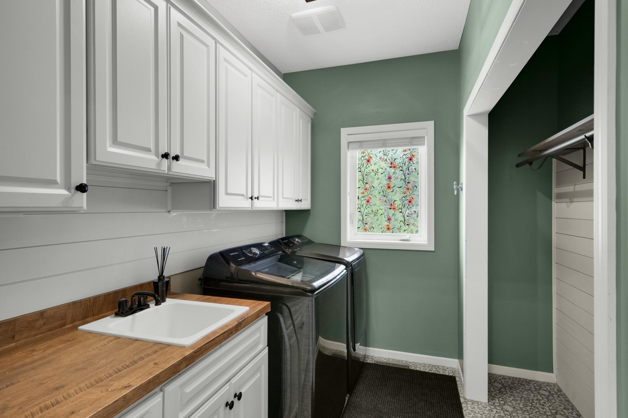 Laundry room of mud room and kitchen and right inside from the garage.