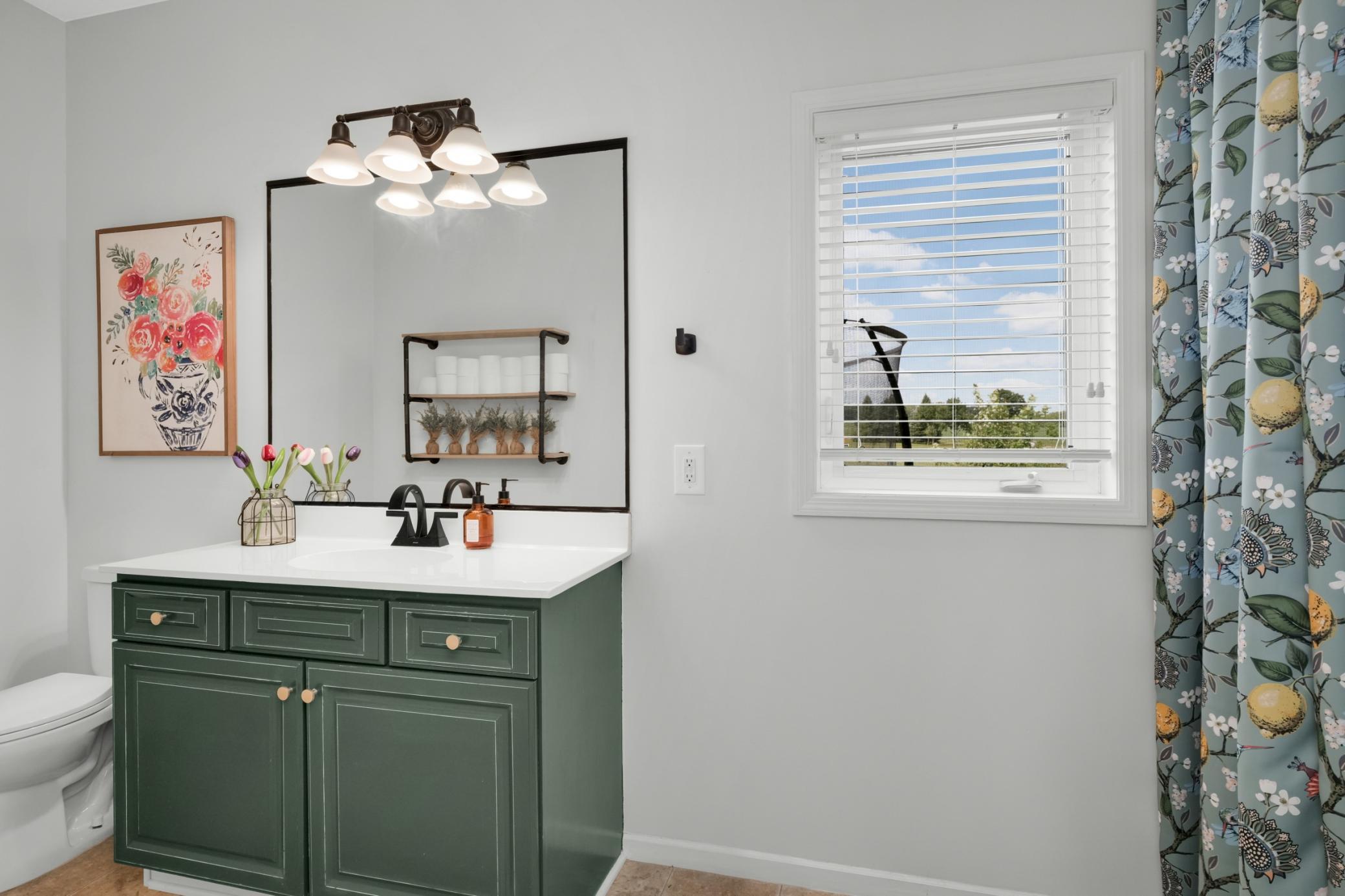 Bathroom that is part of flex bedroom on main floor.