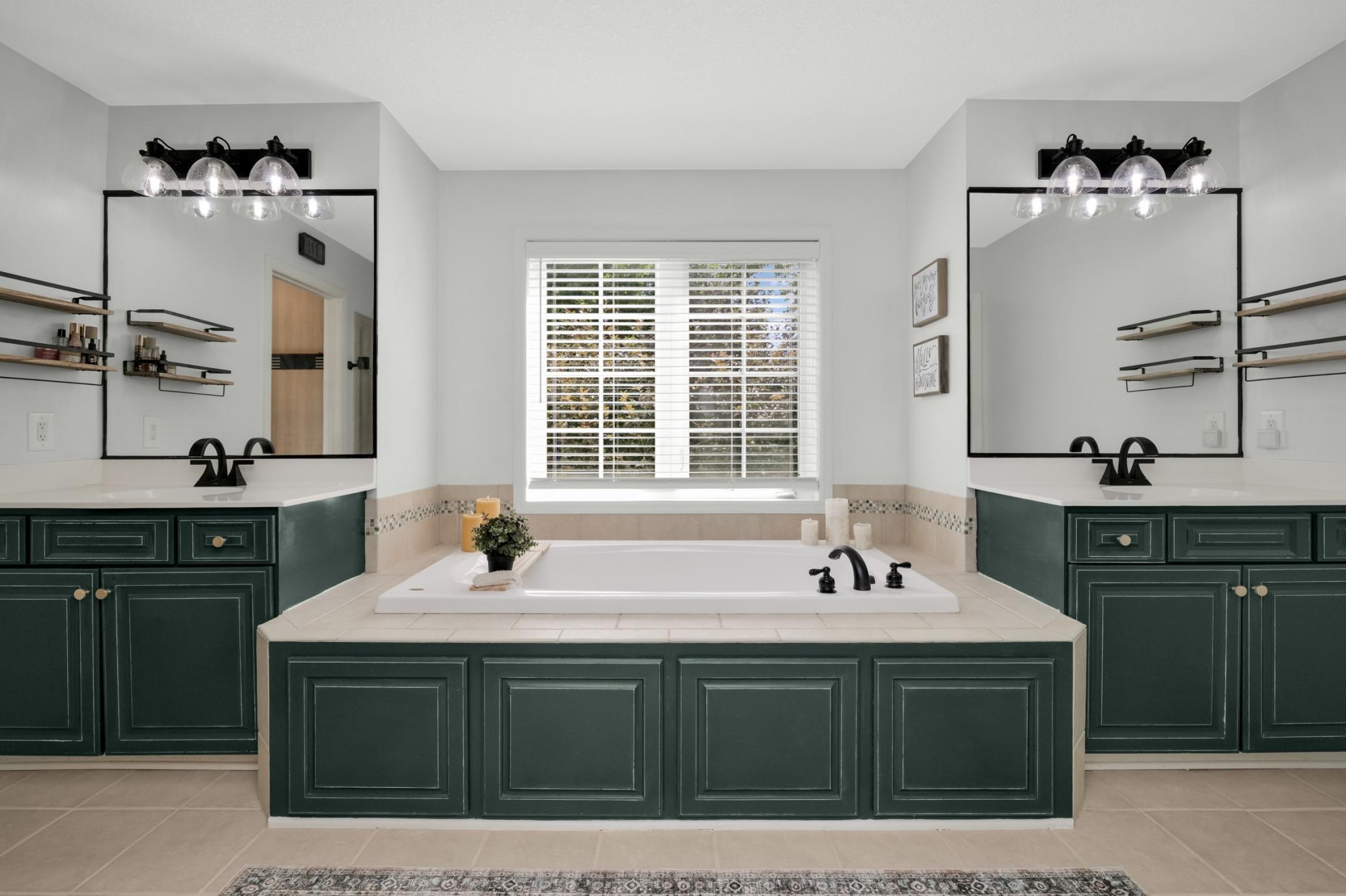 Primary suite bathroom with plenty of space and beautiful.