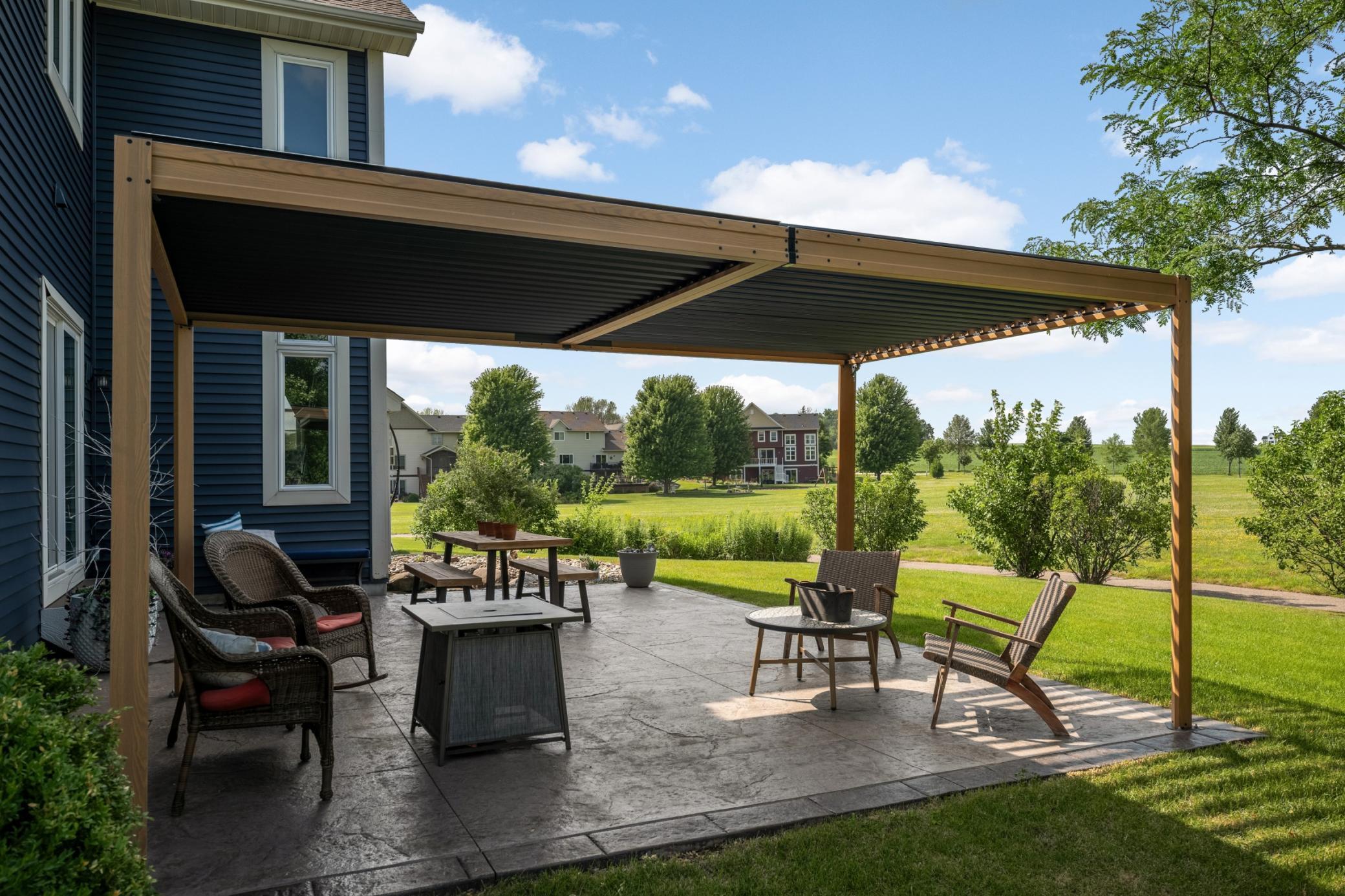 New stamped concrete patio and pergola installed in 2024 that is just wonderful.