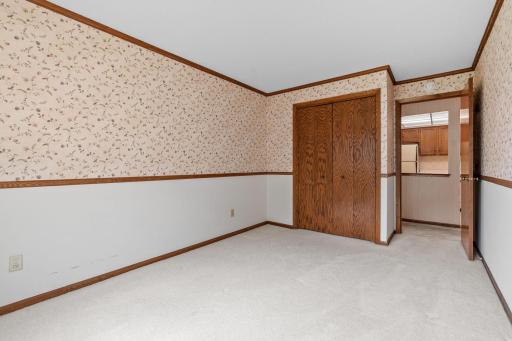 Guest bedroom works well as den or office