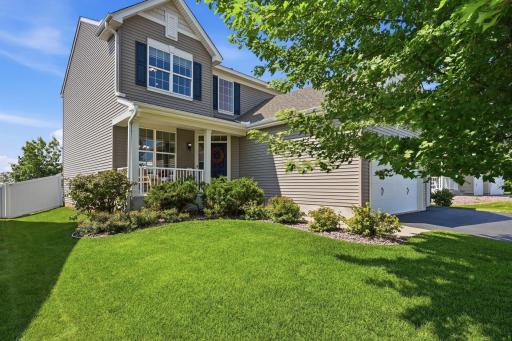 Well-kept yard featuring an underground sprinkler system for easy maintenance.