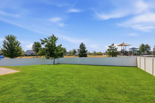 Take a look at that grass! This yard has been lovingly cared for and is ready to enjoy.