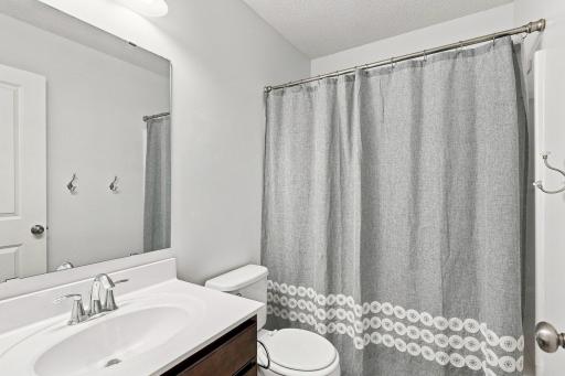 Convenient upper-level bathroom serving the bedrooms.