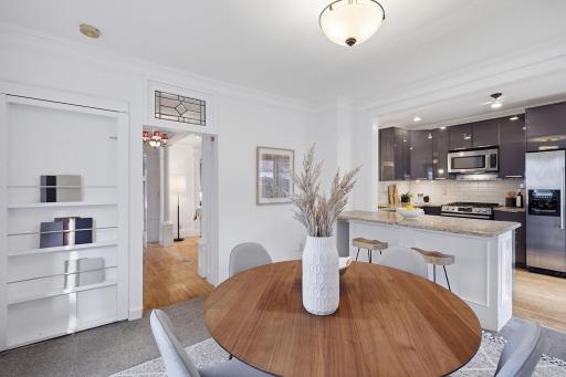 Lead glass windows, custom millwork and updated kitchen provide the perfect backdrop to your life.