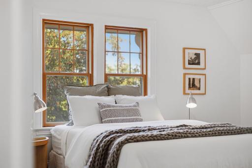 The primary bedroom overlooks Cherokee Park.