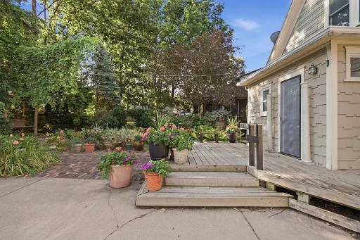 Back deck and patio. The slider doors lead to the kitchen.