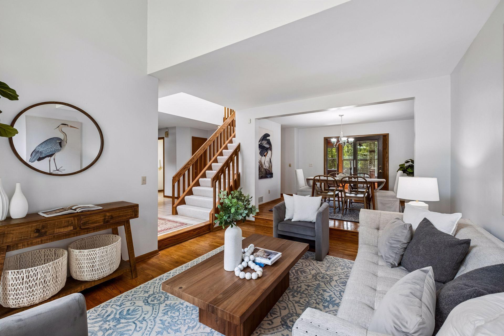Open-concept living with subtle separation keeps the front living area open and inviting.