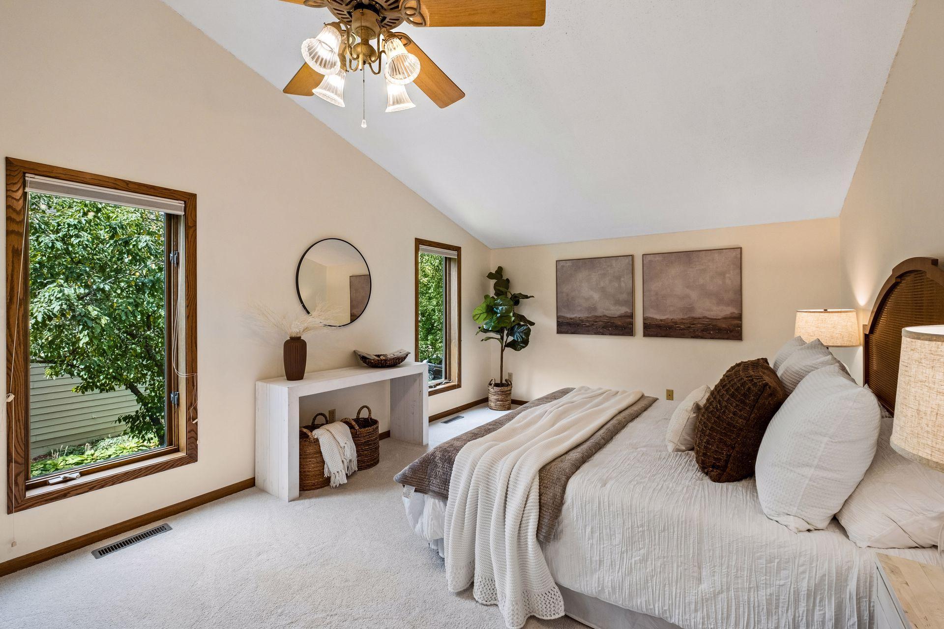 Large primary with vaulted ceiling and private ensuite.