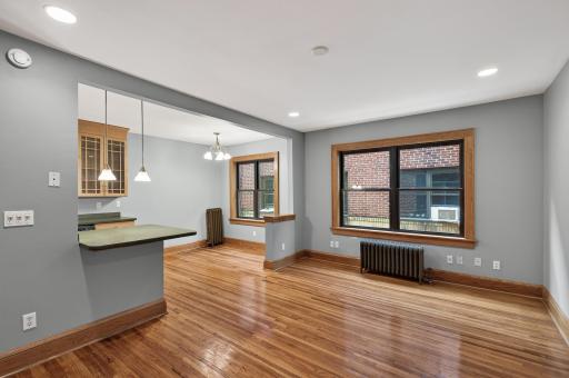 Viewing the main living space into the informal dining space.