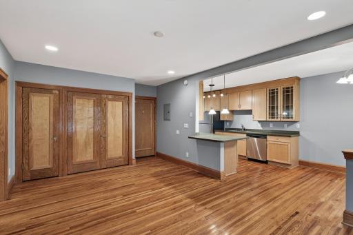 View of the main door and incredible woodwork from the main living space.