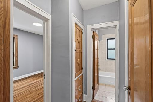 View of the main hallway into bedroom and bathroom.