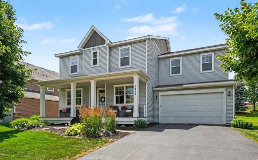 Nicely landscaped yard and a spacious front porch. Tandem 3rd garage stall