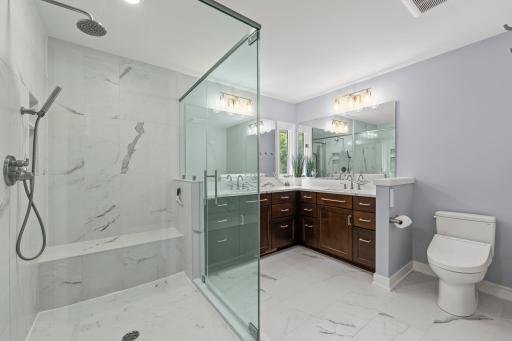 A refined private bath designed as a serene retreat, complementing the newly created primary suite.