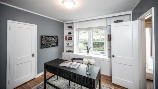 Also on the main level, another bedroom with built-ins