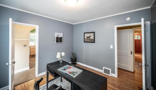 The bedroom / office opens to the kitchen and main halllway