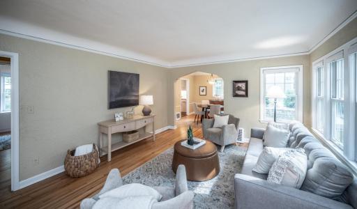 The hand-troweled walls create a cozy atmosphere in the large living room